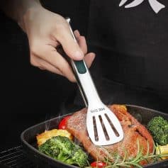 Sleek stainless steel kitchen spatula with "SUS 304" marking, ideal for cooking and grilling, versatile and durable utensil for home and professional kitchen use.