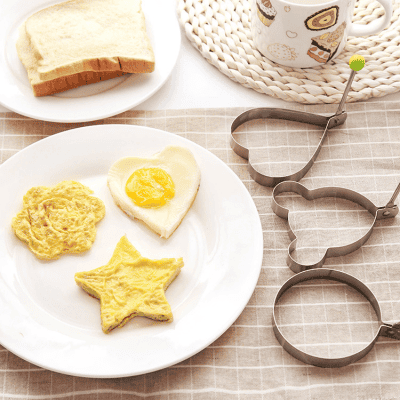 Egg-shaped cookie cutter, breakfast with eggs, bread, and coffee, breakfast baking tools, heart, star, and circle cookie cutters, Monalisa Store, kitchen accessories, cooking utensils, food preparation, baking supplies, food styling, culinary tools, kitchen gadgets, food photography, breakfast recipe tools, baking equipment, pastries, breakfast ideas, culinary accessories.
