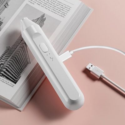 White digital slit lamp for optical eye exams at Monalisa Store, modern optometry equipment for vision testing and eye health assessment.