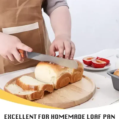 Fresh homemade bread loaf with slicing knife on cutting board, ready for breakfast or snacks at Monalisa Store.