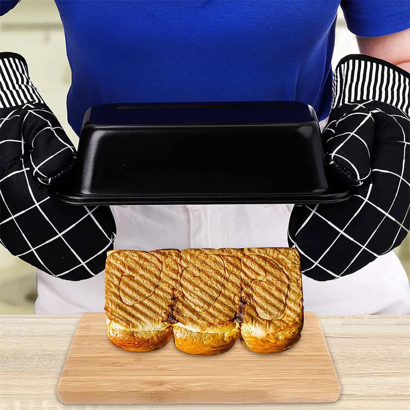 Crispy grilled sandwich on wooden cutting board, person taking photo with smartphone, monochrome oven mitts, modern kitchen setting, food photography for Monalisa Store.