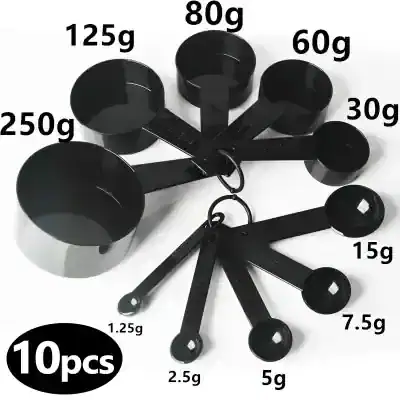 Stack of black calibration weights ranging from 1.25g to 250g, used for precise weight measurement and calibration in scientific and medical settings.