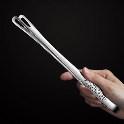 Stainless steel eye care tool with ergonomic handle for precision and comfort in eye examinations and treatment.