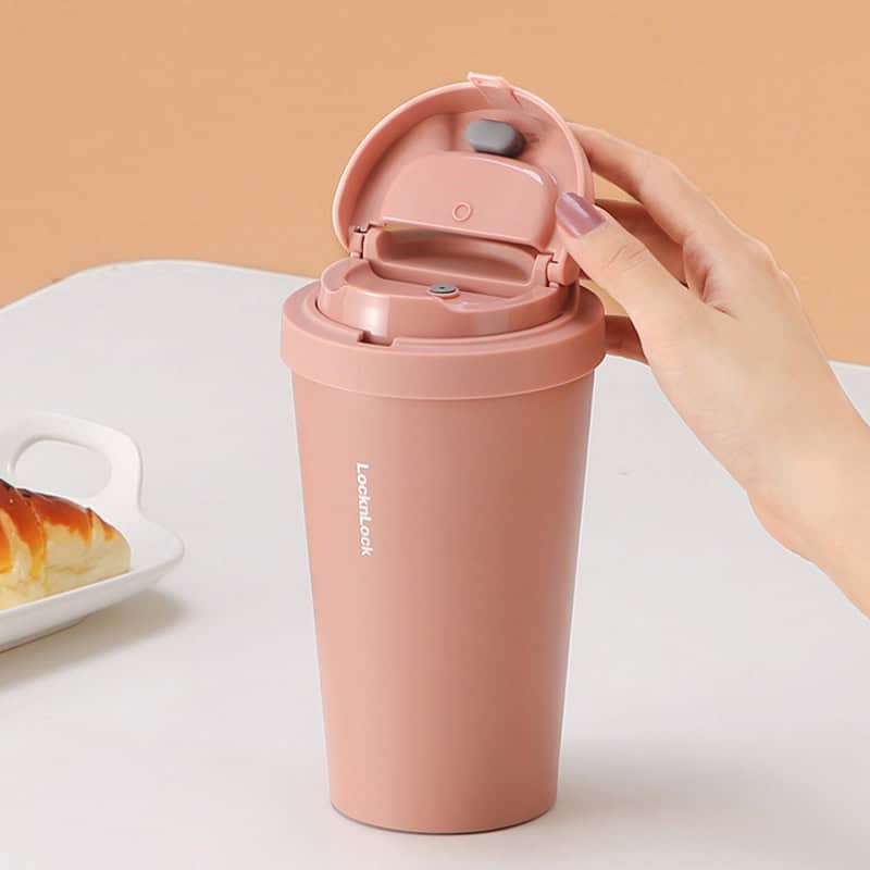 Portable pink thermos with a flip-top lid, ideal for maintaining hot or cold beverages, perfect for on-the-go lifestyles.