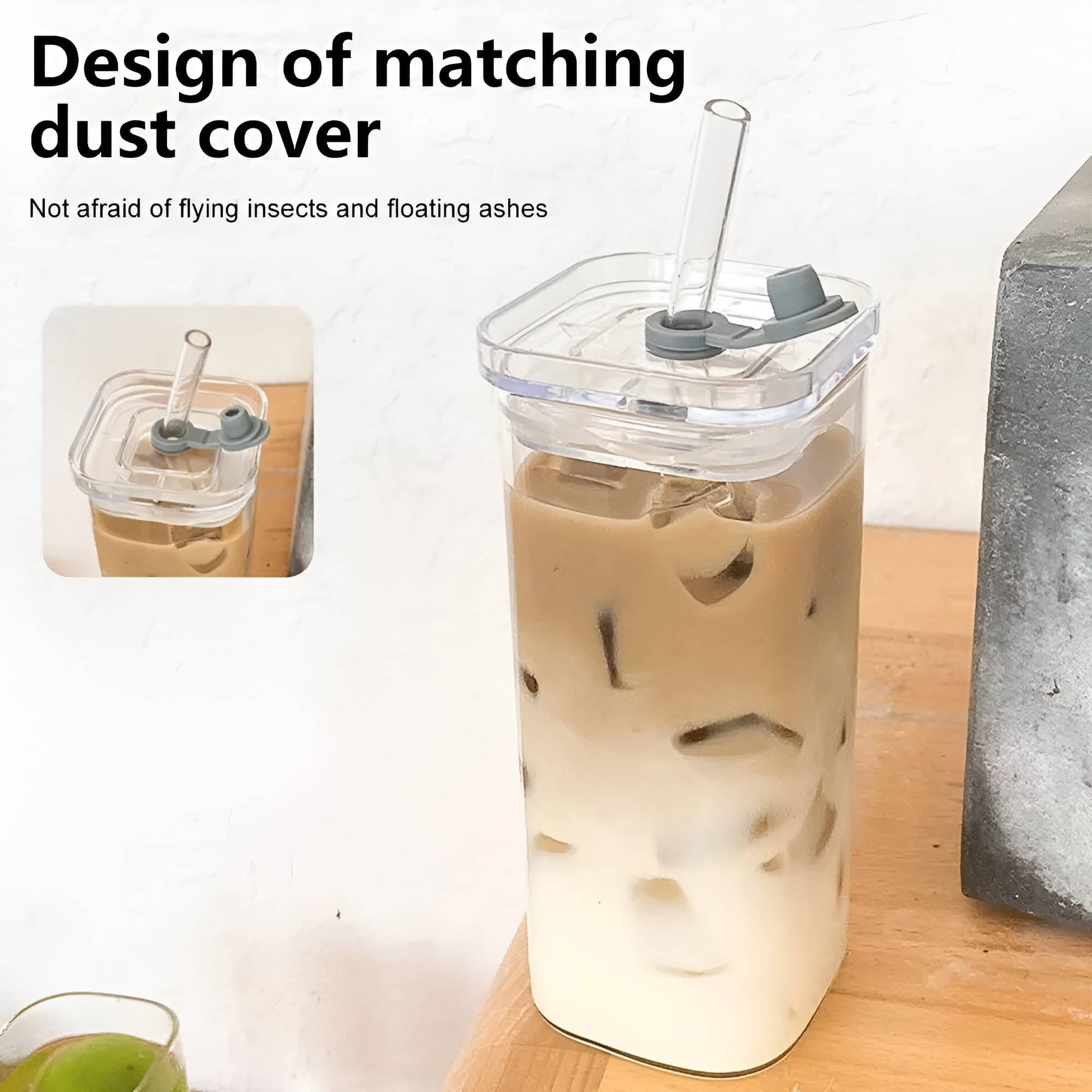 Aesthetic image of a large, clear dust cover with a matching design for a beverage container filled with iced coffee or milk tea, ideal for protecting drinks from flies and floating ashes, with a straw opening.
