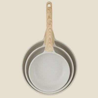 Stainless steel and wooden cookware set, ideal for healthy cooking, durable and stylish, perfect for modern kitchens.