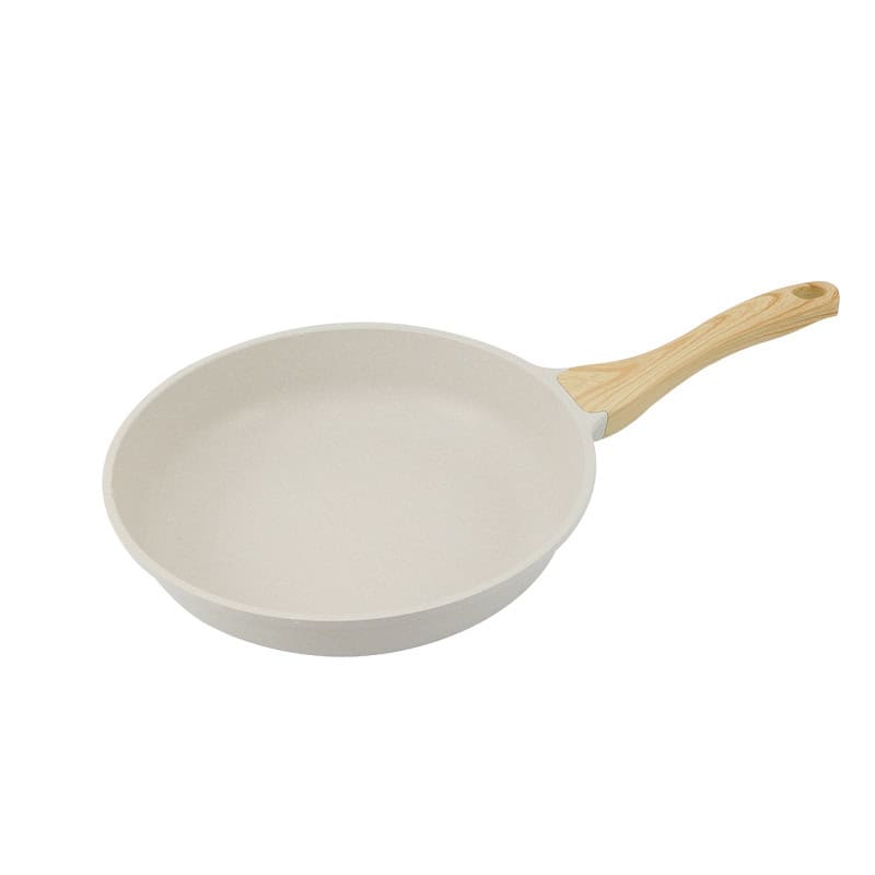 Light beige ceramic frying pan with wooden handle, ideal for healthy cooking and versatile use in the kitchen. Perfect for non-stick frying and sautéing.