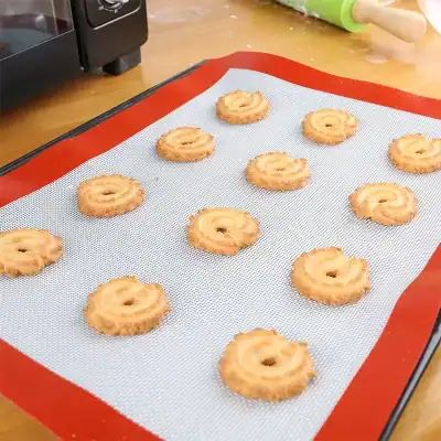 Butter cookies on baking sheet for homemade cookies and desserts, kitchen baking sheet, close-up of freshly baked cookies, baking process, sweet treats, delicious baked goods, cooking at home.