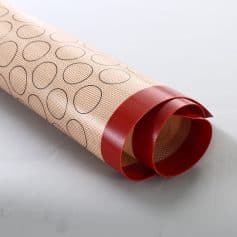 Flexible red and beige silicone emulsion sheet with oval patterns, suitable for medical and cosmetic applications from Monalisa Store.