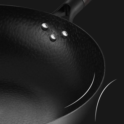 Non-stick textured frying pan for healthy cooking, Monalisa Store kitchen essentials, durable and heat-resistant cookware for everyday use, high-quality nonstick surface for easy food release and cleaning.