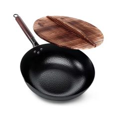 Non-stick cast iron skillet with wooden lid and bamboo spoon for healthy cooking and versatile kitchen use.