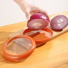Fresh red onion slices with dipping sauce on wooden board at Monalisa Store for optical health and nutrition benefits.