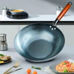 Aluminum non-stick frying pan with wooden handle, suitable for professional kitchen cooking and baking activities.