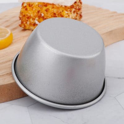 Stainless steel egg mold for breakfast serving, with a smooth matte finish, ideal for shaping soft-boiled eggs. Perfect kitchen tool for breakfast aesthetics and presentation enhancement.