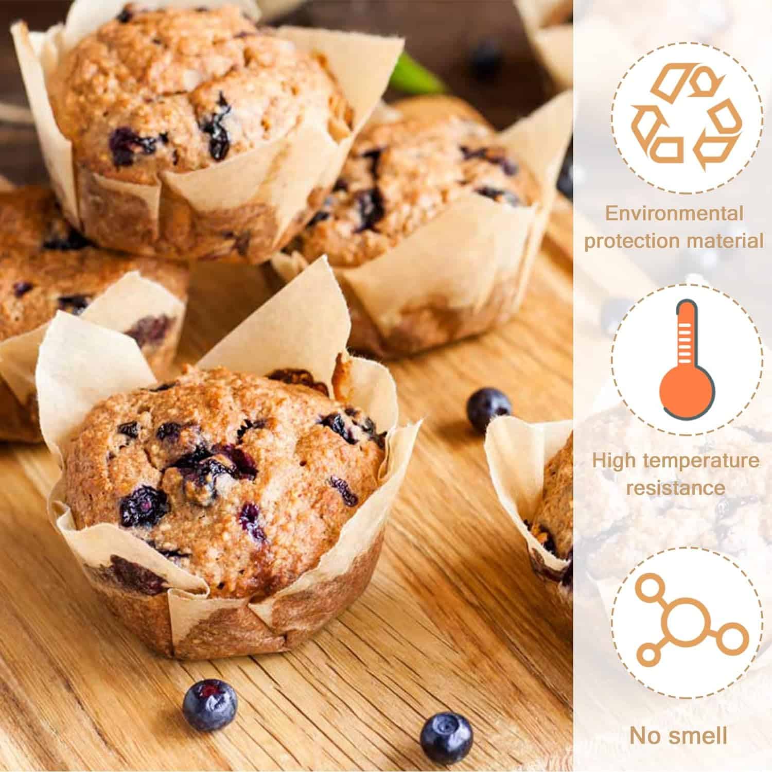 Golden blueberry muffins in parchment paper liners on wooden surface, fresh blueberries scattered around.