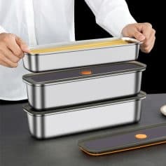 Stainless steel food storage containers with sealed lids, ideal for meal prep and healthy eating, displayed in a modern kitchen setting. Perfect for organizing your meals and maintaining freshness.