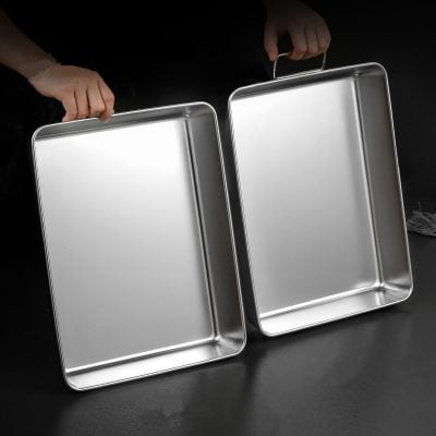 Stainless steel medical trays used for hospital and clinic procedures, durable and easy to sterilize. Perfect for storing and transporting medical instruments and supplies in healthcare settings.