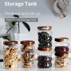 Storage tank jars filled with snacks and herbs at Monalisa Medical Store, showcasing storage solutions for health and wellness products.