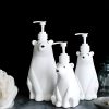 White bear-shaped lotion dispensers for skincare and cosmetics storage, featuring adorable polar bear designs. Perfect for adding a fun, functional touch to bathroom or vanity decor.