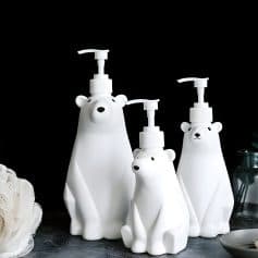 White bear-shaped lotion dispensers for skincare and cosmetics storage, featuring adorable polar bear designs. Perfect for adding a fun, functional touch to bathroom or vanity decor.