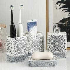 Elegant white and black dental care organizer set with intricate patterns, suitable for toothbrushes, toothpaste, and accessories, ideal for modern bathrooms and dental offices.