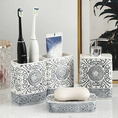 Elegant white and black dental care organizer set with intricate patterns, suitable for toothbrushes, toothpaste, and accessories, ideal for modern bathrooms and dental offices.