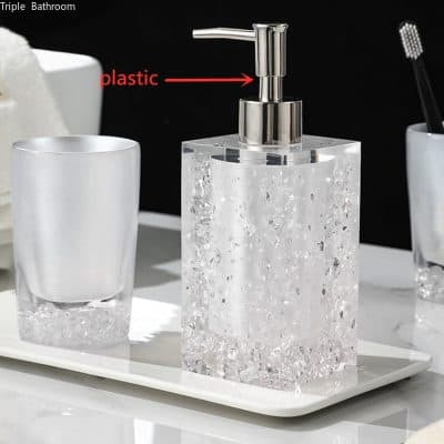 Elegant glass soap dispenser with acrylic base and modern pump, ideal for bathroom or vanity decor. Crafted from clear acrylic, adding a stylish touch to your personal care essentials.