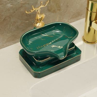 Luxury green jewelry or jewelry accessory tray with gold accents, ideal for organizing or displaying jewelry on vanity or dresser.