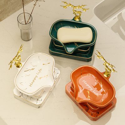 Ceramic soap dishes with gold tree accents and 