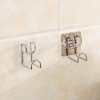 Metal wall hooks for bathroom or medical office use, sturdy stainless steel design, ideal for hanging towels, robes, or accessories. Perfect for clinics, spas, and healthcare facilities.