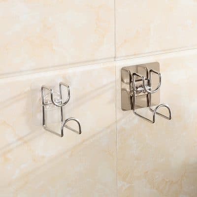 Metal wall hooks for bathroom or medical office use, sturdy stainless steel design, ideal for hanging towels, robes, or accessories. Perfect for clinics, spas, and healthcare facilities.