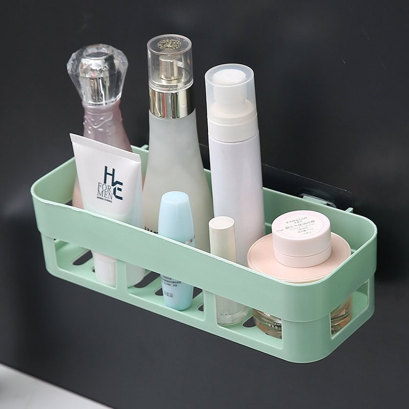 Hydrating skincare products and cosmetic containers organized in a mint green bathroom basket, ideal for daily skincare routines and beauty treatments at Monalisa Store.