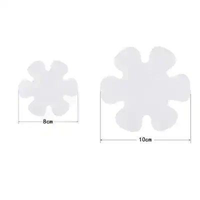 Lightweight foam snowflake-shaped accessories for eyewear, available in various sizes, perfect for decorative glasses or costume props.