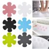 Flexible silicone bath scrubbers in pink, white, black, blue, green, and gray, perfect for gentle cleaning and exfoliation.