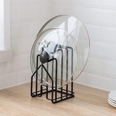 Sterilizer for disinfecting eye lenses, contact lenses, or glasses, featuring a glass lid, black handle, and black metal stand for easy handling and organization.