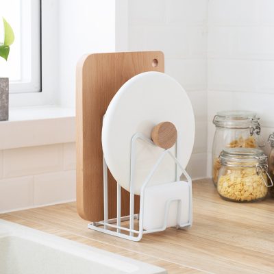 Modern kitchen countertop knife holder with wooden accents and white metal frame, designed for organized storage of knives and kitchen accessories, ideal for kitchen decor and functionality.