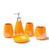 Vivid orange bathroom accessory set including a lotion dispenser, soap dish, toothbrush holder, and cup, ideal for stylish and colorful bathroom decor.