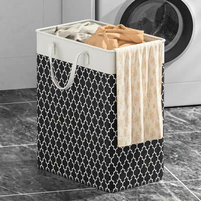 Laundry hamper for clothing organization, stylish black and white patterned storage bin for laundry room.