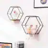 Cute plush toys on modern black hexagonal wall shelves in a stylish room decor setup for kids' room, nursery, or children's play area.