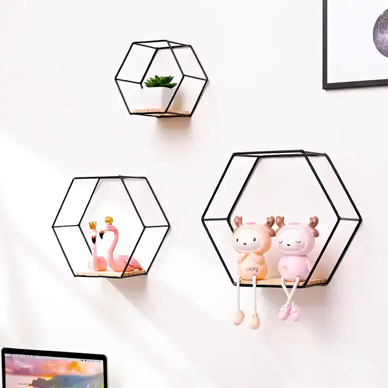 Modern geometric wall shelves with decorative plush toys and plants, ideal for stylish home or office decor, perfect for organizing small items and adding a contemporary touch to your space.