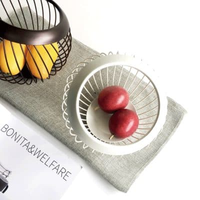 Fresh apples in modern fruit baskets at Monalisa Medical Store, promoting healthy eating and wellness products. Perfect for eye care and nutrition-focused health solutions.