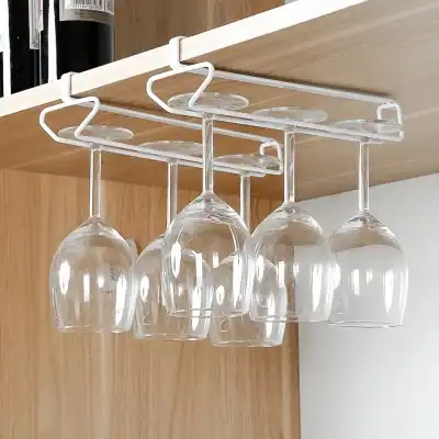 Glass wine glasses hanging from a ceiling rack, ideal for bar or restaurant settings, featuring a sleek and modern design. Perfect for enhancing dining or beverage service experience.