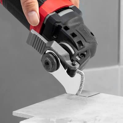 Powerful handheld jigsaw tool used for precise cutting of tiles, wood, and other materials, ideal for professional and DIY home improvement projects at Monalisa Store.