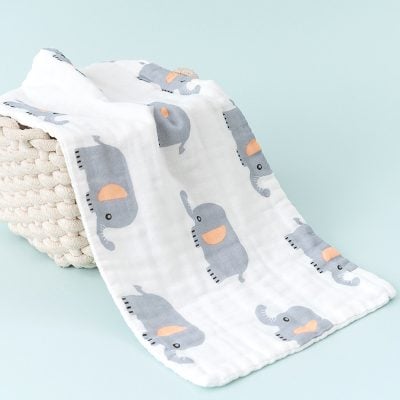 Soft baby muslin blanket with cartoon elephants, perfect for infants and toddlers, made from breathable, high-quality fabric for gentle comfort and easy care.