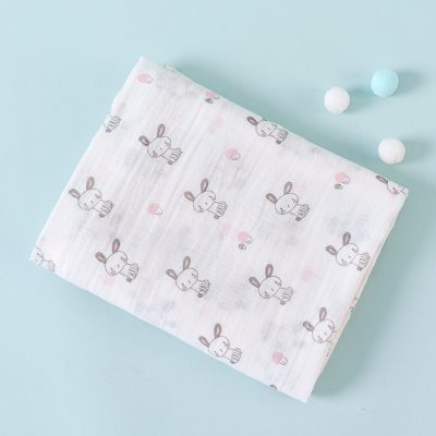 Soft baby crib sheet with cute bunny print, ideal for infants and toddlers, made from breathable cotton for comfort and safety. Perfect for nurseries and kids' bedrooms.