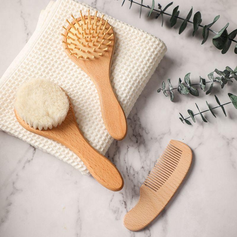 Soft natural wooden massage brushes and exfoliating scrubber with handle for skincare and beauty routines.
