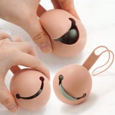 Smile face stress relief balls with loop, novelty squishy toys for relaxation, fun desk accessories for stress reduction, cute smiling balloons for kids and adults.