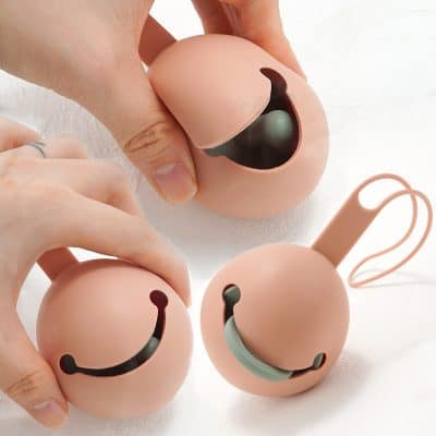Smile face stress relief balls with loop, novelty squishy toys for relaxation, fun desk accessories for stress reduction, cute smiling balloons for kids and adults.