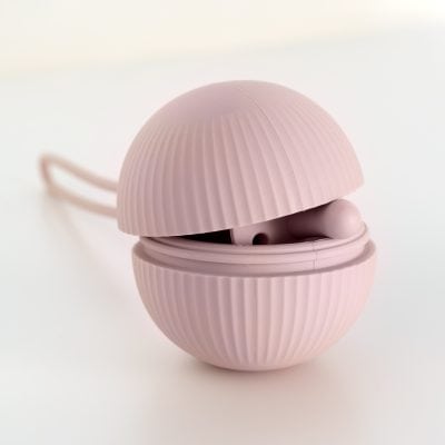 Wireless pink earbuds in a matching textured round case, showcasing stylish and portable audio accessories from Monalisa Store, perfect for modern hearing needs.