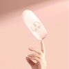 Wireless LED light therapy device for skin care and rejuvenation, stylish white design, easy-to-use controls, ideal for facial treatments.